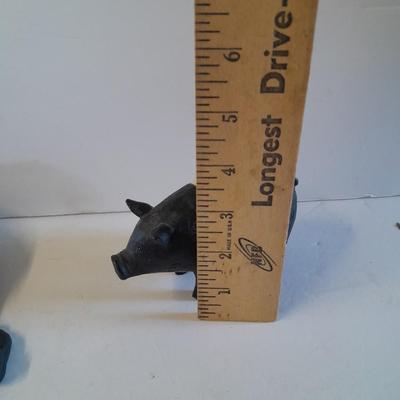 Mother pig figure with little babies and a live laugh love pig figure