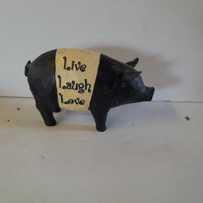 Mother pig figure with little babies and a live laugh love pig figure