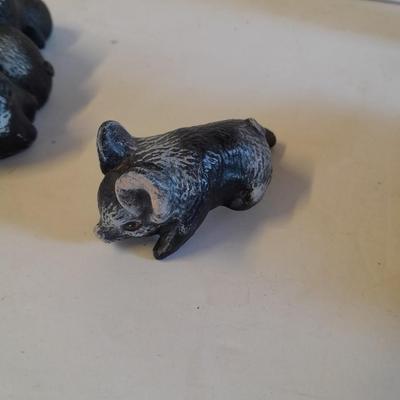 Mother pig figure with little babies and a live laugh love pig figure
