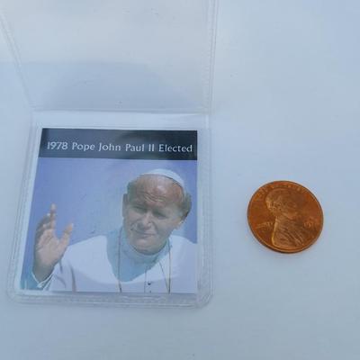 Three Collectible pennies, Wall Street stock market crash, Pope John Paul II, and end of WW1