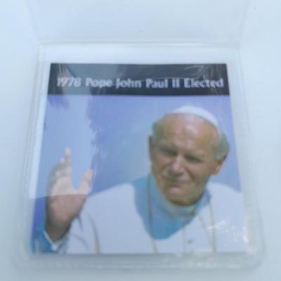 Three Collectible pennies, Wall Street stock market crash, Pope John Paul II, and end of WW1