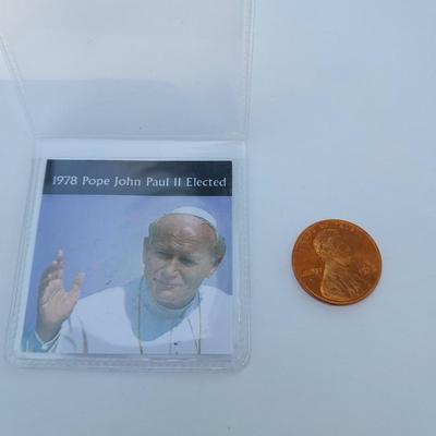 Three Collectible pennies, Wall Street stock market crash, Pope John Paul II, and end of WW1