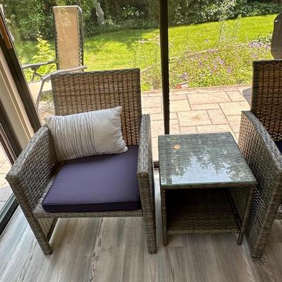 Four outdoor/indoor chairs (two with cushions) and side table