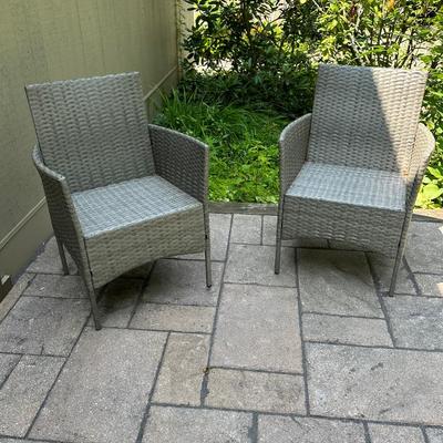 Four outdoor/indoor chairs (two with cushions) and side table