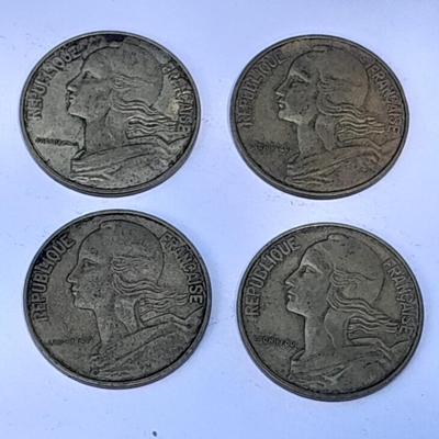 Four France 20 Centimes coins