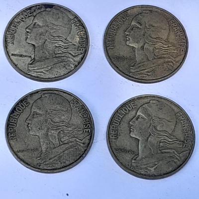 Four France 20 Centimes coins