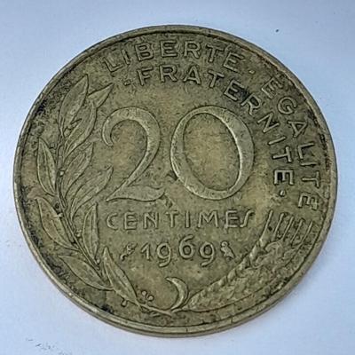 Four France 20 Centimes coins