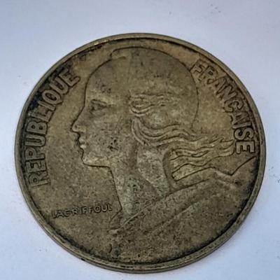 Four France 20 Centimes coins