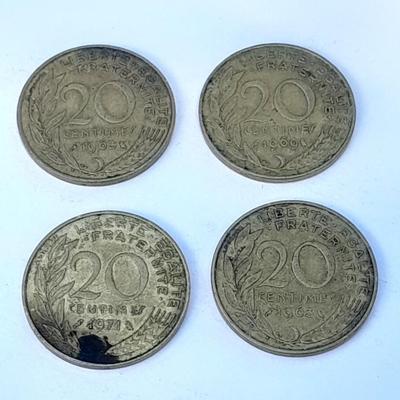 Four France 20 Centimes coins