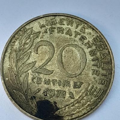 Four France 20 Centimes coins