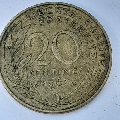 Four France 20 Centimes coins