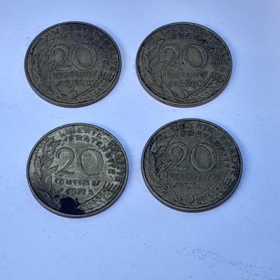 Four France 20 Centimes coins