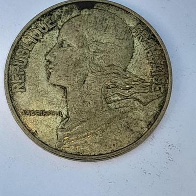 Four France 20 Centimes coins