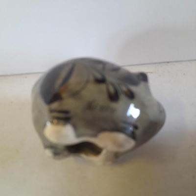Five small pig figures, wood pigs, floral salt & pepper, and a pottery pig