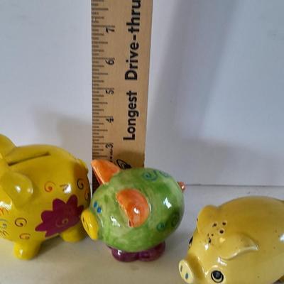 Colorful pig collectibles Piggy banks and vintage pig plate