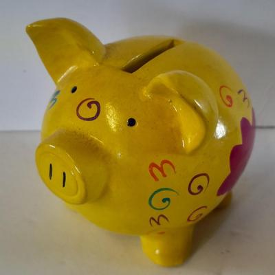 Colorful pig collectibles Piggy banks and vintage pig plate