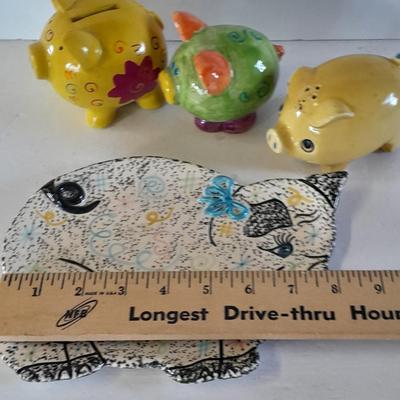 Colorful pig collectibles Piggy banks and vintage pig plate