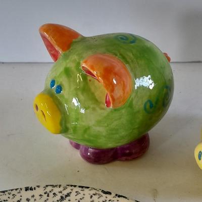 Colorful pig collectibles Piggy banks and vintage pig plate