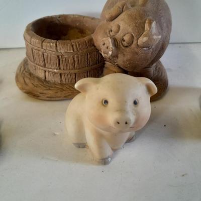 Eight Farm themed pig collectible figures -