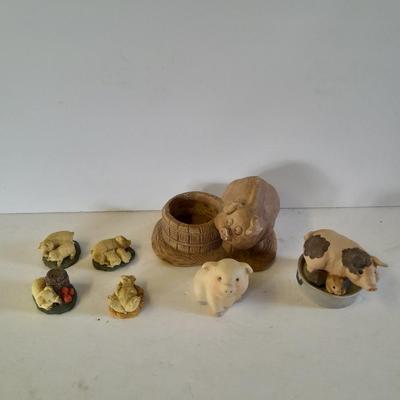 Eight Farm themed pig collectible figures -