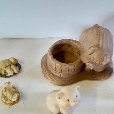 Eight Farm themed pig collectible figures -