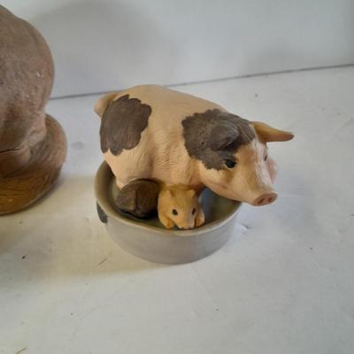 Eight Farm themed pig collectible figures -