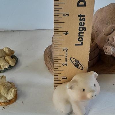 Eight Farm themed pig collectible figures -