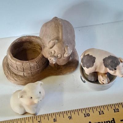 Eight Farm themed pig collectible figures -