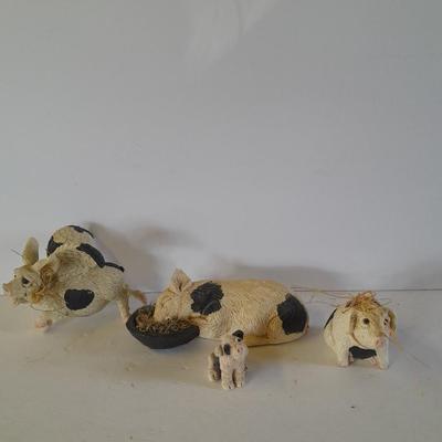 Black and white pig figures, flying pig shelf sitter, and more