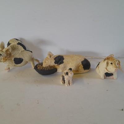Black and white pig figures, flying pig shelf sitter, and more