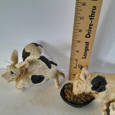 Black and white pig figures, flying pig shelf sitter, and more