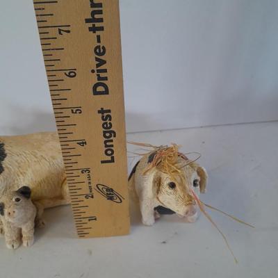 Black and white pig figures, flying pig shelf sitter, and more