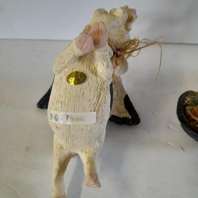 Black and white pig figures, flying pig shelf sitter, and more