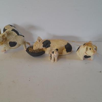 Black and white pig figures, flying pig shelf sitter, and more