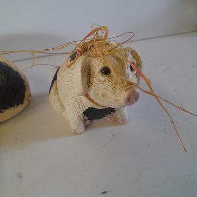 Black and white pig figures, flying pig shelf sitter, and more