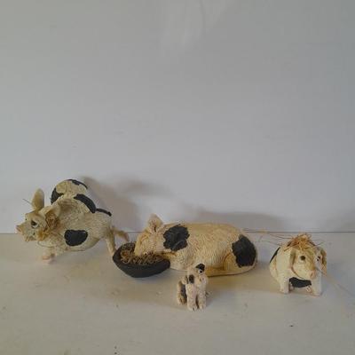 Black and white pig figures, flying pig shelf sitter, and more