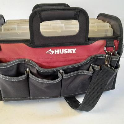 Husky tool bag with plastic insert organizing boxes.