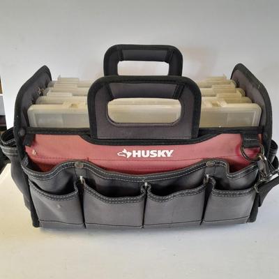 Husky tool bag with plastic insert organizing boxes.