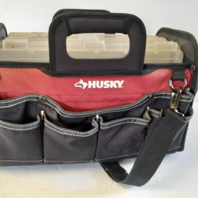 Husky tool bag with plastic insert organizing boxes.