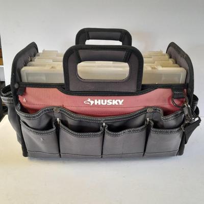 Husky tool bag with plastic insert organizing boxes.
