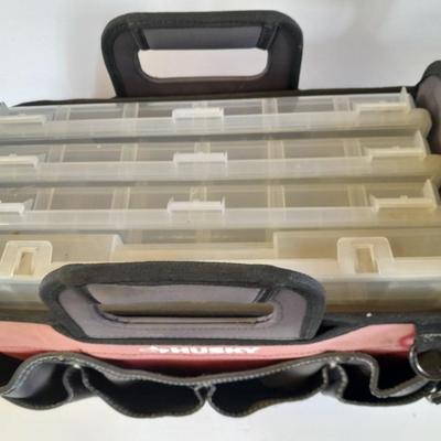 Husky tool bag with plastic insert organizing boxes.