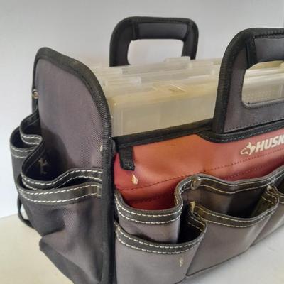 Husky tool bag with plastic insert organizing boxes.
