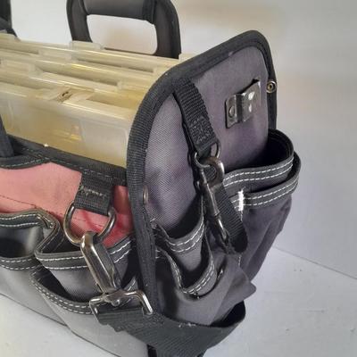 Husky tool bag with plastic insert organizing boxes.