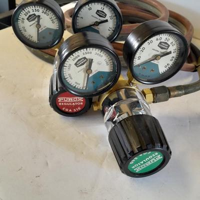 Acetylene and Oxygen hoses with gauges, torch tips and new replacement hoses