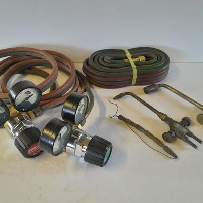 Acetylene and Oxygen hoses with gauges, torch tips and new replacement hoses