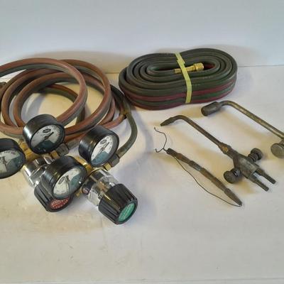 Acetylene and Oxygen hoses with gauges, torch tips and new replacement hoses