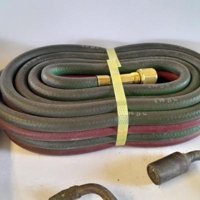 Acetylene and Oxygen hoses with gauges, torch tips and new replacement hoses