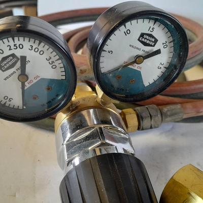 Acetylene and Oxygen hoses with gauges, torch tips and new replacement hoses