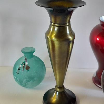 Brass candle holder / vase, red glass vases and other home decor