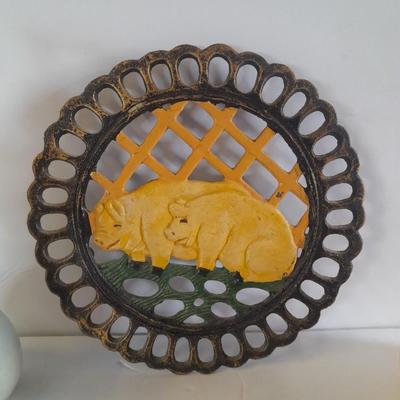 Pig Kitchen items metal trivet, soap dispenser, bowls, and pig figure